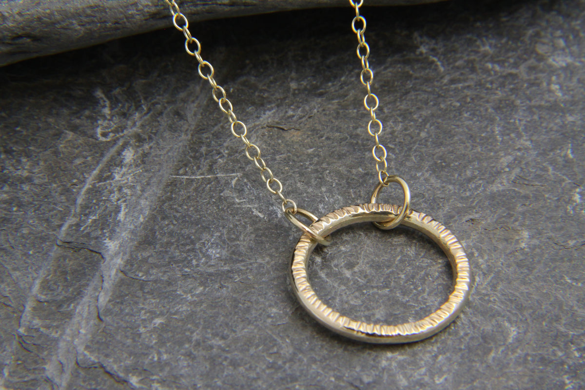 Hammered gold deals circle necklace